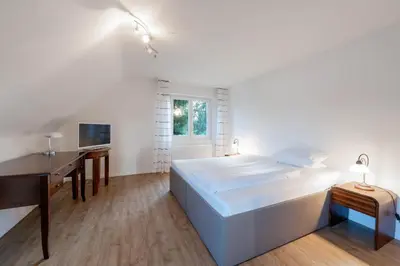 Ein Bett oder Betten in einem Zimmer der Unterkunft Westend Hotel