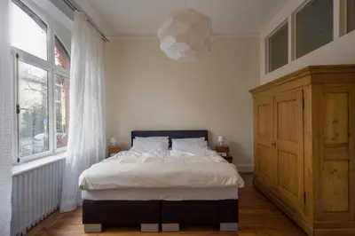 Ein Bett oder Betten in einem Zimmer der Unterkunft Zweite Heimat Heidelberg