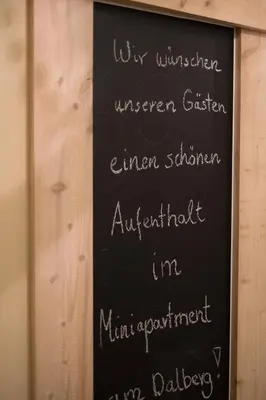 Ein Zertifikat, Auszeichnung, Logo oder anderes Dokument, das in der Unterkunft Miniapartment am Dalberg ausgestellt ist