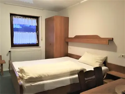 Ein Bett oder Betten in einem Zimmer der Unterkunft Gasthaus Löwen