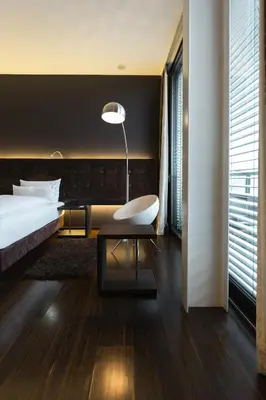 Ein Bett oder Betten in einem Zimmer der Unterkunft SAKS Urban Design Hotel Kaiserslautern