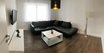 Ein Sitzbereich in der Unterkunft Hugo18 Boardinghouse