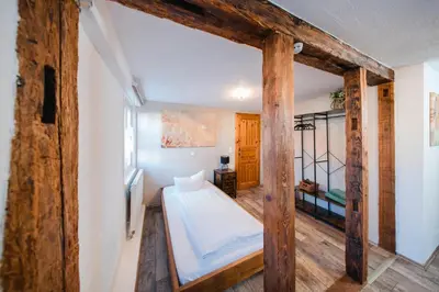 Ein Bett oder Betten in einem Zimmer der Unterkunft Landhotel im Hexenwinkel