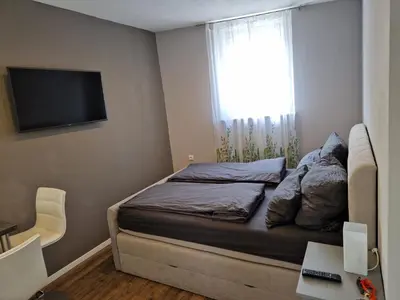 Ein Bett oder Betten in einem Zimmer der Unterkunft Ferienwohnung Alte Linde