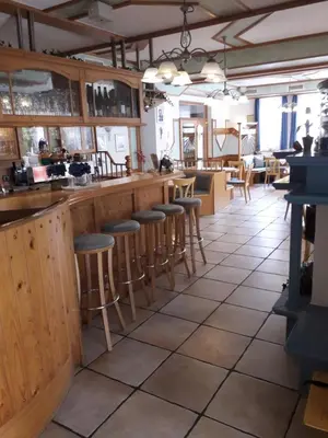Ein Restaurant oder anderes Speiselokal in der Unterkunft LandGASTHOF Rose