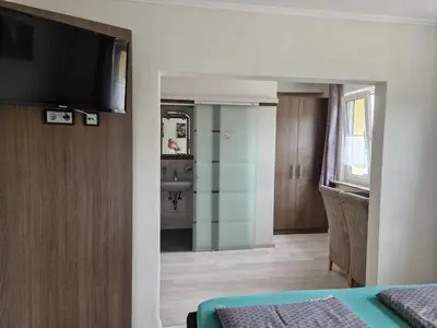 Ein Bett oder Betten in einem Zimmer der Unterkunft LandGASTHOF Rose