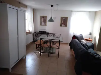 Ein Sitzbereich in der Unterkunft House of ‘Welcome
