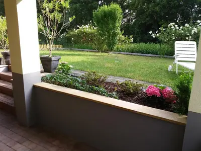 Ein Garten an der Unterkunft House of ‘Welcome