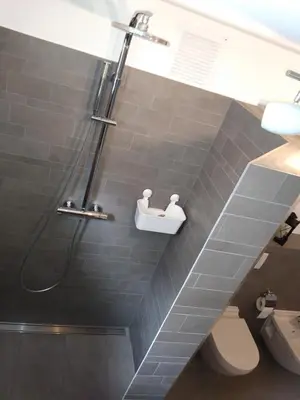 Ein Badezimmer in der Unterkunft House of ‘Welcome