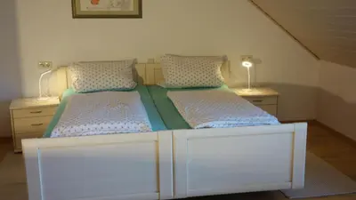 Ein Bett oder Betten in einem Zimmer der Unterkunft Ferienhaus - Kern