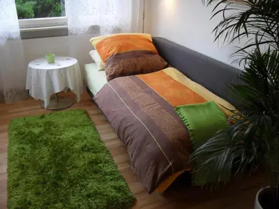 Ein Bett oder Betten in einem Zimmer der Unterkunft Ambiente in Karlsruhe City