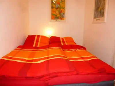 Ein Bett oder Betten in einem Zimmer der Unterkunft Ambiente in Karlsruhe City