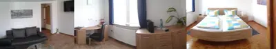 Ein Bett oder Betten in einem Zimmer der Unterkunft Wein-und Gasthof Zipf