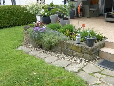 Ein Garten an der Unterkunft Ferienwohnung Baier