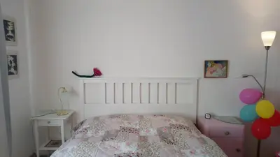 Ein Bett oder Betten in einem Zimmer der Unterkunft Casa la Collina delle Ginestre