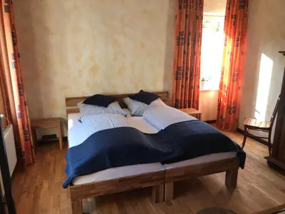 Ein Bett oder Betten in einem Zimmer der Unterkunft Ernst-Ludwig-Promenade