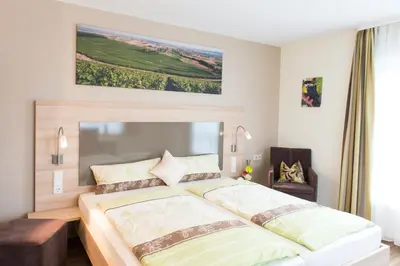 Ein Bett oder Betten in einem Zimmer der Unterkunft Landpension Kohler