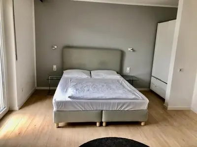 Ein Bett oder Betten in einem Zimmer der Unterkunft City Hotel und City Apartments Centrum
