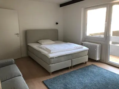 Ein Bett oder Betten in einem Zimmer der Unterkunft City Hotel und City Apartments Centrum