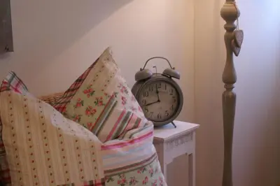 Ein Bett oder Betten in einem Zimmer der Unterkunft Landhaus Grinnerhof