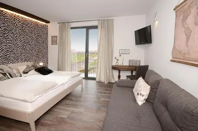 Ein Bett oder Betten in einem Zimmer der Unterkunft Vinotel Dollt-Kern