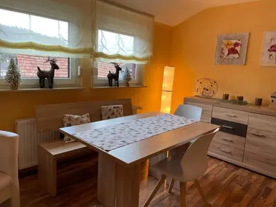 Ein Sitzbereich in der Unterkunft Haus am Kastanienwald