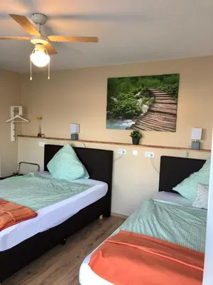 Ein Bett oder Betten in einem Zimmer der Unterkunft Kraft Hotel Alzey Worms A61