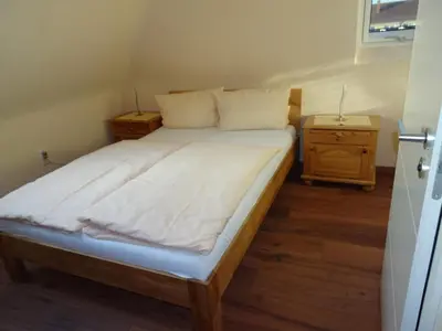 Ein Bett oder Betten in einem Zimmer der Unterkunft Hotel & Weinstube Restaurant Filling