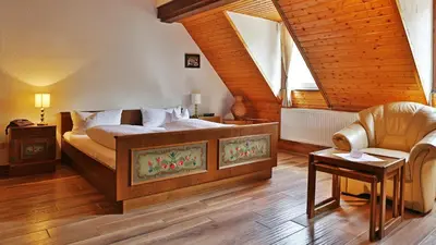 Ein Bett oder Betten in einem Zimmer der Unterkunft Hotel Restaurant Mönchhof