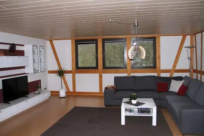 Ein Sitzbereich in der Unterkunft Ferienwohnung Schlierbachtal