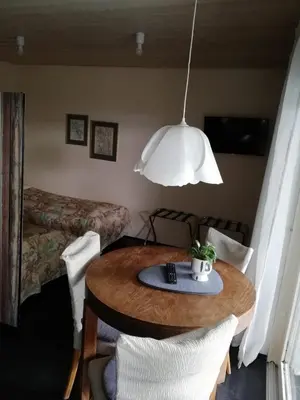 Ein Sitzbereich in der Unterkunft Ferienwohnung Holl
