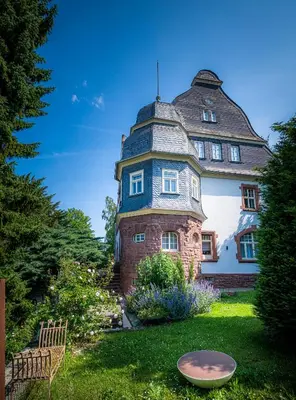 Ein Garten an der Unterkunft BLUMEINS - Das Refugium