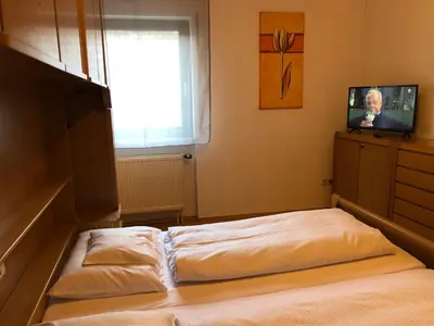 Ein Bett oder Betten in einem Zimmer der Unterkunft Gasthof Zur Krone Garni