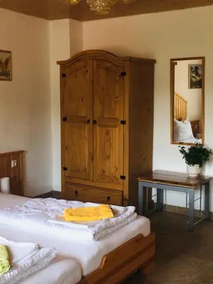 Ein Bett oder Betten in einem Zimmer der Unterkunft Natur und Neckarblick bei Heidelberg