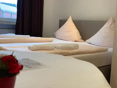 Ein Bett oder Betten in einem Zimmer der Unterkunft Hotel Restaurant Memo