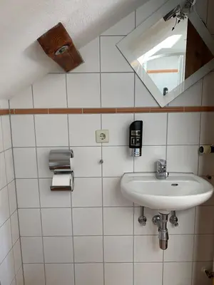 Ein Badezimmer in der Unterkunft Pension Bergel