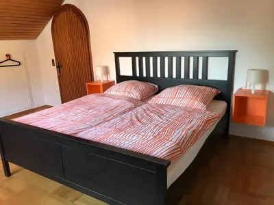 Ein Bett oder Betten in einem Zimmer der Unterkunft Ferienwohnung Seerose Bad Wildbad i. Schwarzwald