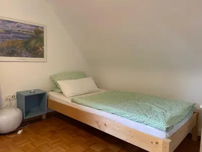 Ein Bett oder Betten in einem Zimmer der Unterkunft Ferienwohnung Seerose Bad Wildbad i. Schwarzwald