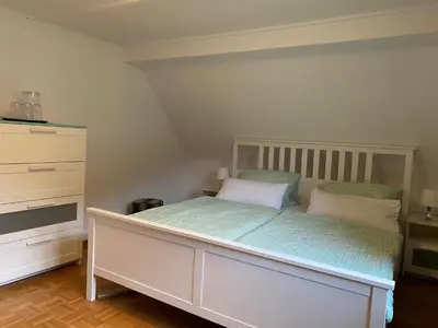 Ein Bett oder Betten in einem Zimmer der Unterkunft Ferienwohnung Seerose Bad Wildbad i. Schwarzwald