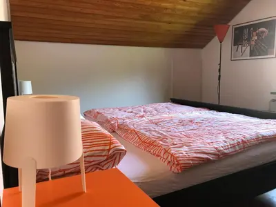 Ein Bett oder Betten in einem Zimmer der Unterkunft Ferienwohnung Seerose Bad Wildbad i. Schwarzwald