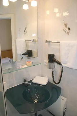 Ein Badezimmer in der Unterkunft Hotel bei Liebe's