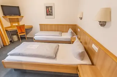 Ein Bett oder Betten in einem Zimmer der Unterkunft Hotel-Gasthof zum Ritter