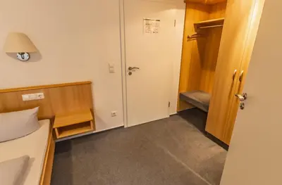 Ein Bett oder Betten in einem Zimmer der Unterkunft Hotel-Gasthof zum Ritter