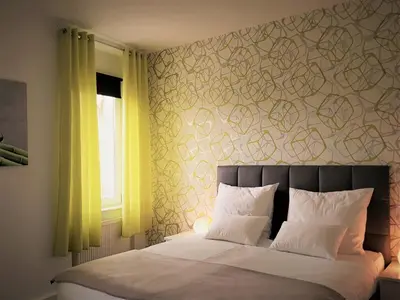 Ein Bett oder Betten in einem Zimmer der Unterkunft Hotel Schützen