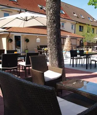 Ein Restaurant oder anderes Speiselokal in der Unterkunft Hotel zum Ochsen