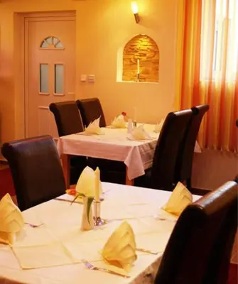Ein Restaurant oder anderes Speiselokal in der Unterkunft Hotel zum Ochsen