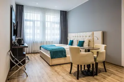 Ein Bett oder Betten in einem Zimmer der Unterkunft RheinCity Hotel & Boardinghouse