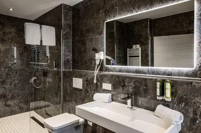 Ein Badezimmer in der Unterkunft RheinCity Hotel & Boardinghouse