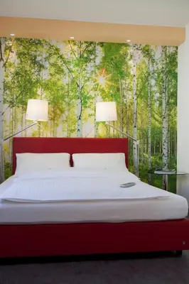 Ein Bett oder Betten in einem Zimmer der Unterkunft Hotel Erbprinzenhof