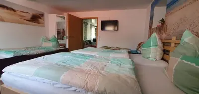 Ein Bett oder Betten in einem Zimmer der Unterkunft Die Ferienwohnung in Lörzweiler